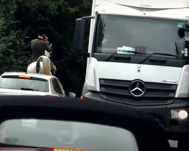 Members of the Warwickshire Hunt were filmed in October causing traffic disruption on a high crash risk section of the busy Fosse Way in Warwickshire. This rider was on his phone as traffic queued behind him.