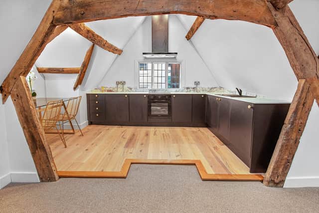 A unique kitchen incorporating the original woodwork of the Market Place property, now called Tudor Yard