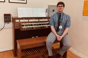 Teacher of music, Dylan McCaig, with The Warriner School's new electronic organ (courtesy of the Royal College of Organists and Viscount Organs)