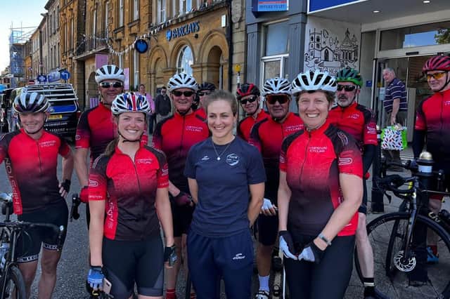 Grace Brown joined by Shipston Cycling Club members in Chipping Norton town centre. Andy Smith can been seen behind Grace – third from the left.