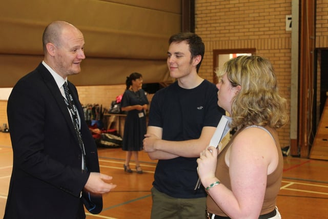 Chenderit students Lochlan Bullworthy Rosie Gee with Billy Belstone Assistant Headteacher and Head of Sixth Form.