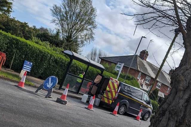 Third time lucky. A bus stop is installed in its final position in Springfield Avenue, Banbury