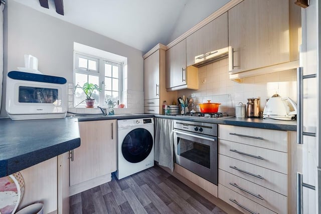 The flat features a cosy modern kitchen.
