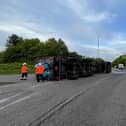 A single-vehicle collision involving an overturned lorry carrying chickens led to the closure of the A422 near Banbury for more than four hours last night, Monday May 16. (photo from Northants Fire & Rescue Service)