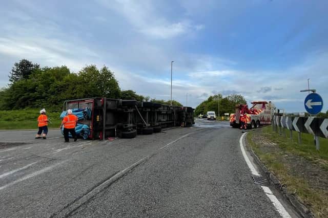 A single-vehicle collision involving an overturned lorry carrying chickens led to the closure of the A422 near Banbury for more than four hours last night, Monday May 16. (photo from Northants Fire & Rescue Service)