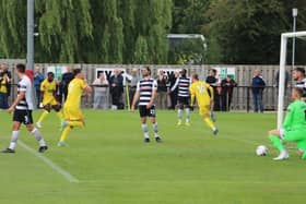 Morgan Roberts heads off to celebrate after scoring Banbury United's winner in their 2-1 success at Darlington. Pictures courtesy of Banbury United FC