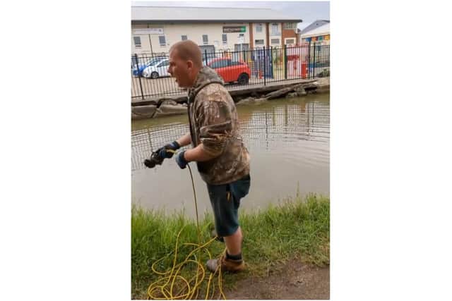 The look of shock from Shane Phillips after he found an old grenade while magnet fishing in the Oxford Canal in Banbury on Sunday May 15 (photo from Shane's Facebook page with permission)