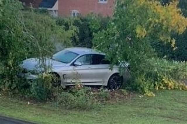A stolen BMW skidded off the road in Banbury and ended up in a bush.
