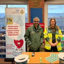 Volunteer responder and optometrist Nimish Desai, and Evin, who work for the South Central Ambulance Service Charity.j