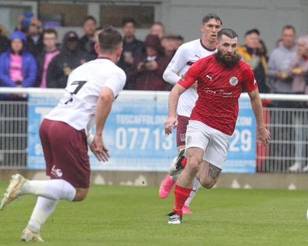 Striker Danny Newton on the attack for Brackley Town against the Cobblers on Saturday (Picture: Pete Norton/Getty Images)
