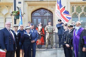 Members of the armed forces raising the flag at Banbury Town Hall last year.