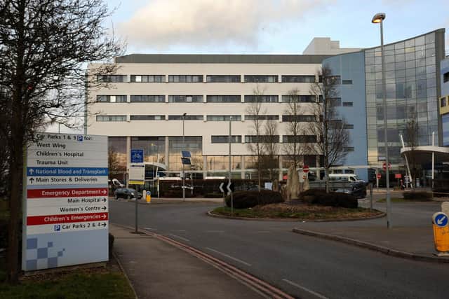 The John Radcliffe Hospital, Oxford. Health bosses say patients should turn up for appointments during strike action unless otherwise informed