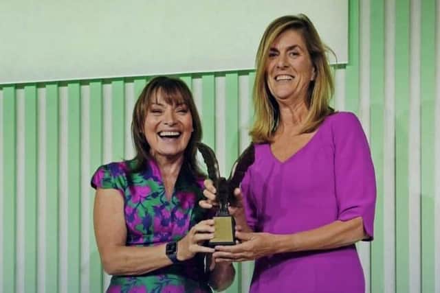 Lorraine Kelly presents the Woman of the Year award to Sarah Burrows of Children Heard and Seen