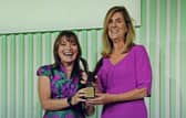 Lorraine Kelly presents the Woman of the Year award to Sarah Burrows of Children Heard and Seen