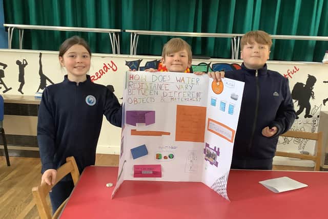 Harriers Academy Banbury pupils Chloe Griffiths, Patryk Koziol and Romeo Griffin take part in Science Week activities
