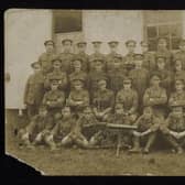 A group photograph taken when building POW Camp in Salonika with A Tolley, men with guns. 8th Bn Oxf and Bucks (SOFO Museum).