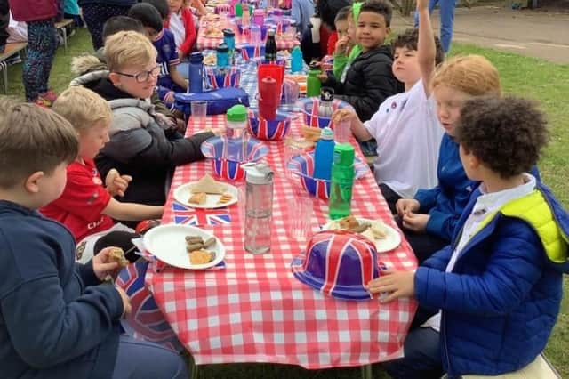 The children at Wroxton CE Primary School enjoyed a feast of sandwiches,  pastries and most importantly jelly and ice-cream. Every child in school was presented with a special Jubilee pin badge, courtesy of Friends of Wroxton parent group.