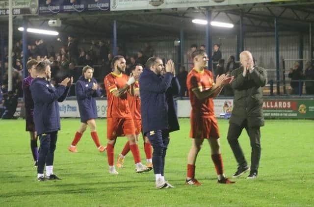 Andy Whing and his players applaud the travelling fans after Banbury United's 3-1 defeat at King's Lynn Town on Tuesday. Picture courtesy of Banbury United FC