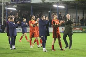 Andy Whing and his players applaud the travelling fans after Banbury United's 3-1 defeat at King's Lynn Town on Tuesday. Picture courtesy of Banbury United FC