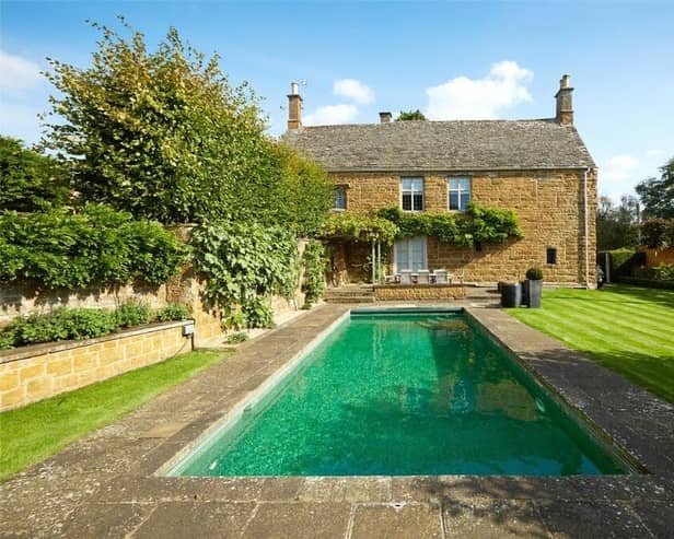 One of the Manor Farmhouse's main selling points is its heated outdoor swimming pool.