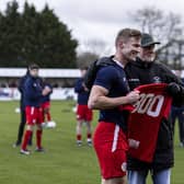 Brackley Town captain Gaz Dean was presented with a commemorative shirt to mark his 300th appearance for the club ahead of last weekend's clash with Chester. Pictures by Glenn Alcock
