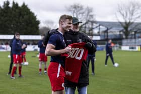 Brackley Town captain Gaz Dean was presented with a commemorative shirt to mark his 300th appearance for the club ahead of last weekend's clash with Chester. Pictures by Glenn Alcock