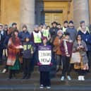 Councillors and residents of Chipping Norton take part in a peace vigil on the steps of the town hall on Monday