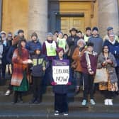 Councillors and residents of Chipping Norton take part in a peace vigil on the steps of the town hall on Monday