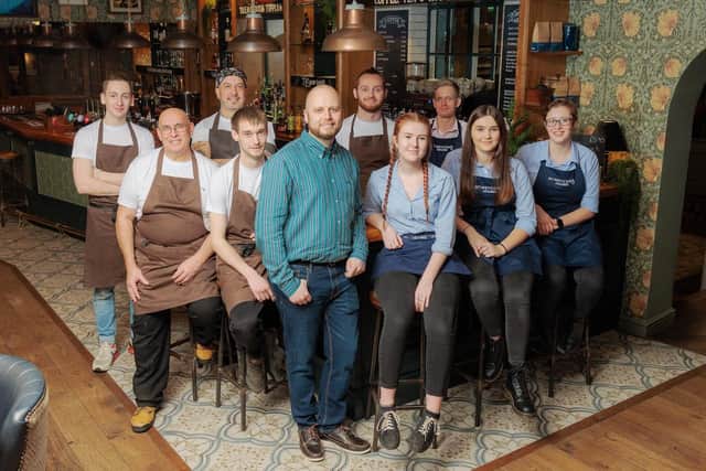 Staff at The George Townhouse pub in Shipston, which won county pub of the year for 2022 National Pub & Bar Awards. Pictured: The George’s front of house and kitchen teams. General manager, Matt Hiscoe, in blue striped shirt. (photo by Nick Osborne)