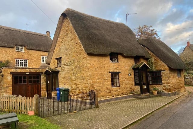 The thatched roof detached cottage is one of the oldest properties in the quaint village of Wroxton.