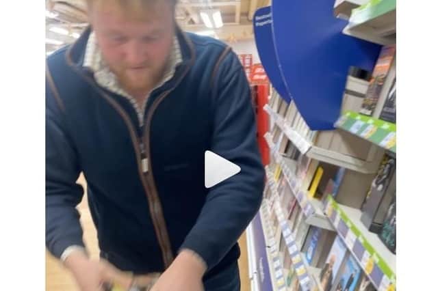 Kaleb Cooper secretly signs copies of his book in Banbury. This is a still from his video in his Instagram page: cooper_kaleb