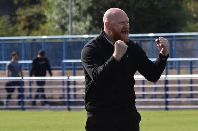 Andy Whing shows his delight after Banbury United kicked off life in the National League North with a 2-1 win at Curzon Ashton. Picture by Julie Hawkins