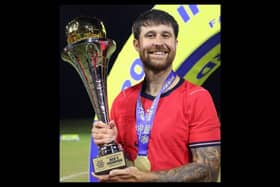 Banbury footballer Harry Baker has helped England make history by winning the Cerebral Palsy World Cup for the first time.