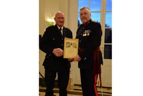 Hook Norton firefighter alongside Oxfordshire County Council’s Fire and Rescue Service’s Chief Fire Officer Rob MacDougall.