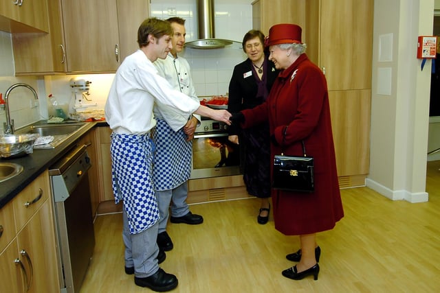 The Queen with chefs Kevin Long and Alan Stanney with home manager Sue Northcott.