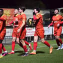Jack Stevens takes the congratulations after he opened the scoring in Banbury United's 2-2 draw with Leamington on Tuesday night. Picture by Julie Hawkins