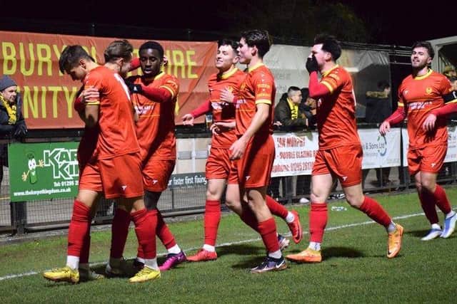Jack Stevens takes the congratulations after he opened the scoring in Banbury United's 2-2 draw with Leamington on Tuesday night. Picture by Julie Hawkins
