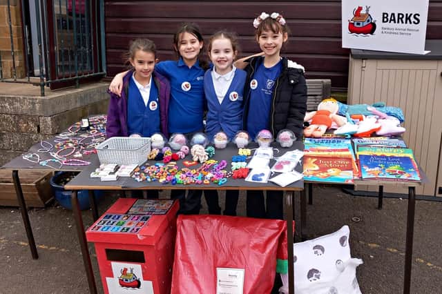 Sophie Alcock, Freya Cockle, Dolly King and Alicia Radzinska get ready to sell recycled and upcycled crafts made by pupils and staff at Hornton Primary School.