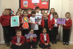 The pupils at St. Leonard's School displaying some of their fantastic artwork.