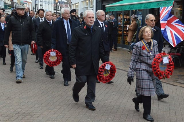 Hundreds of people lined the streets of the town centre to pay their respects.