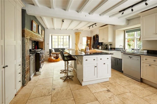 The kitchen with breakfast island in The Old Manor in the village of Cropredy.

Photo: Savills