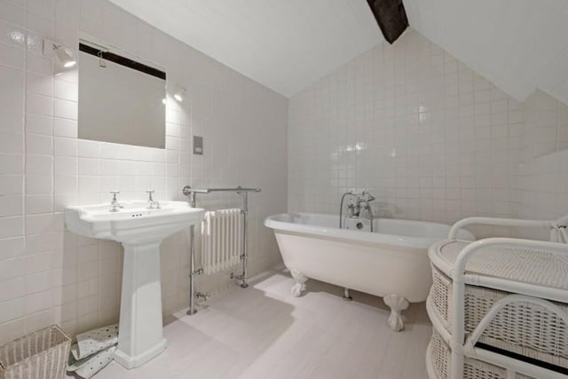 A large free standing bath is the main fetaure of the family bathroom.