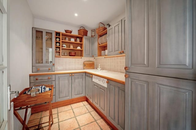 The house contains a kitchen storage room.