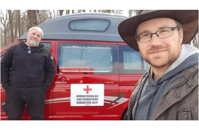 Chris Rossi, who is a Cherwell District Council employee from Woodford Halse, and Graham Hughes with the group UK 4 Ukraine stand next to their van, which they had registered at the Humanitarian Aid Centre near the Ukrainian and Polish border.