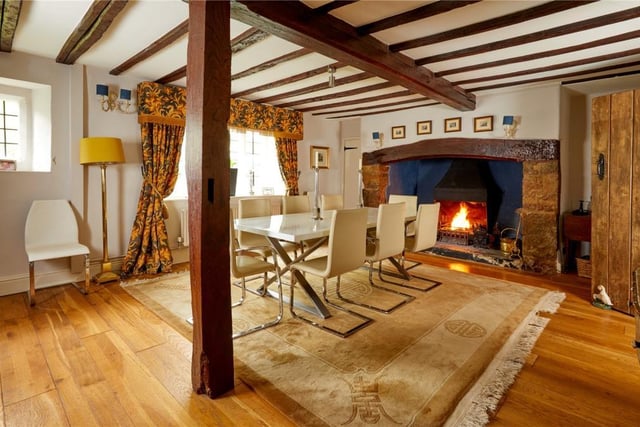 The dining room, with fireplace inside The Old Manor.

Photo: Savills