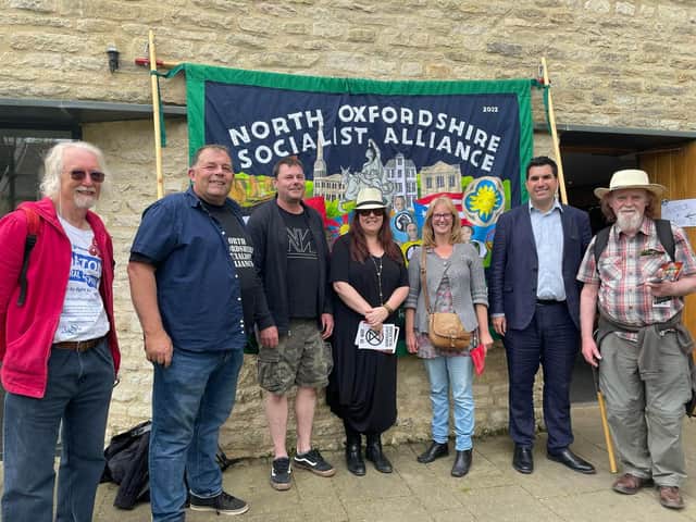 North Oxfordshire Socialist Alliance members, l - r, Steve Kilsby, Simon Garrett, Gary McDonald, Cassi Perry, Caroline Brookes and  Phil Richards with MP Richard Burgeon, second from right