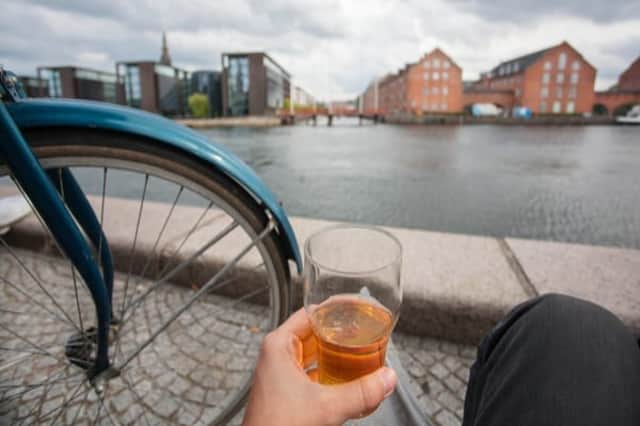Is it illegal to have a pint and jump on your bike? (Photo: Shutterstock)
