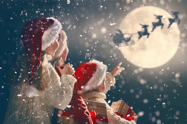 If you and your little ones are excited for Santa to arrive and want to track his journey as he travels the globe on Christmas Eve, here’s how (Photo: Shutterstock)