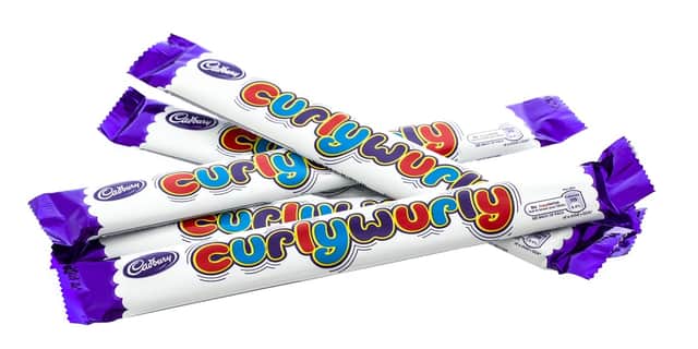 Cadbury is cutting the calories of their popular Chomp, Curly Wurly and Fudge chocolate bars, in an attempt to tackle childhood obesity (Photo: Shutterstock)