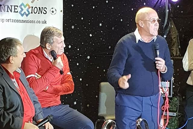 Alan Kennedy and Phil Neal on stage